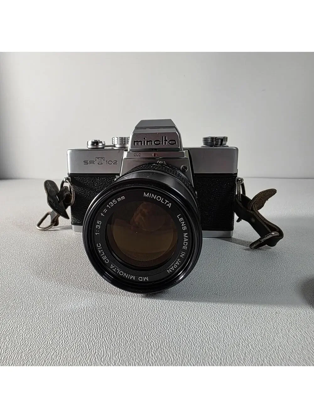 Minolta SRT 102 SLR Film Camera W/135mm MD Celtic f/3.5 Telephoto Lens